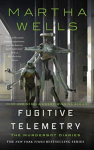 Cover of 'Fugitive Telemetry,' featuring author Martha Wells' name in thin, large green font above a CGI-style image of Murderbot and a 8-limbed bipedal robot walking through a warehouse-like space.